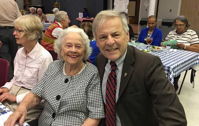 David Toscano at the 25th anniversary lunch of the Senior Center with former city councilor Betz Gleason and many others
